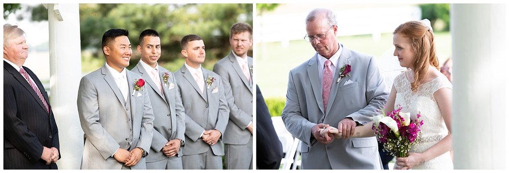groom smiling as bride comes down the aisle