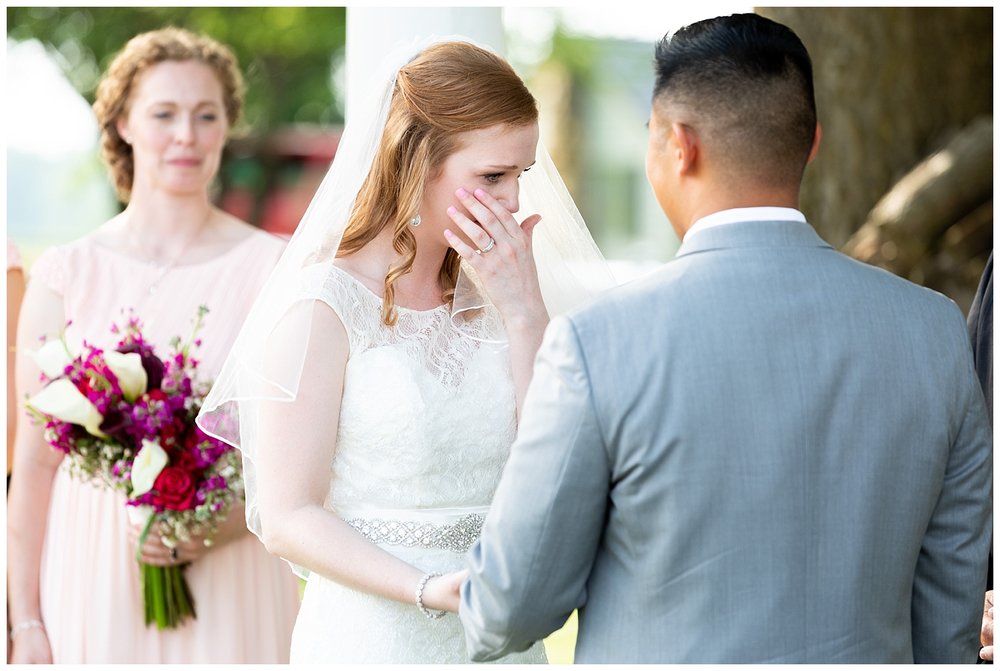 bride crying during ceremony