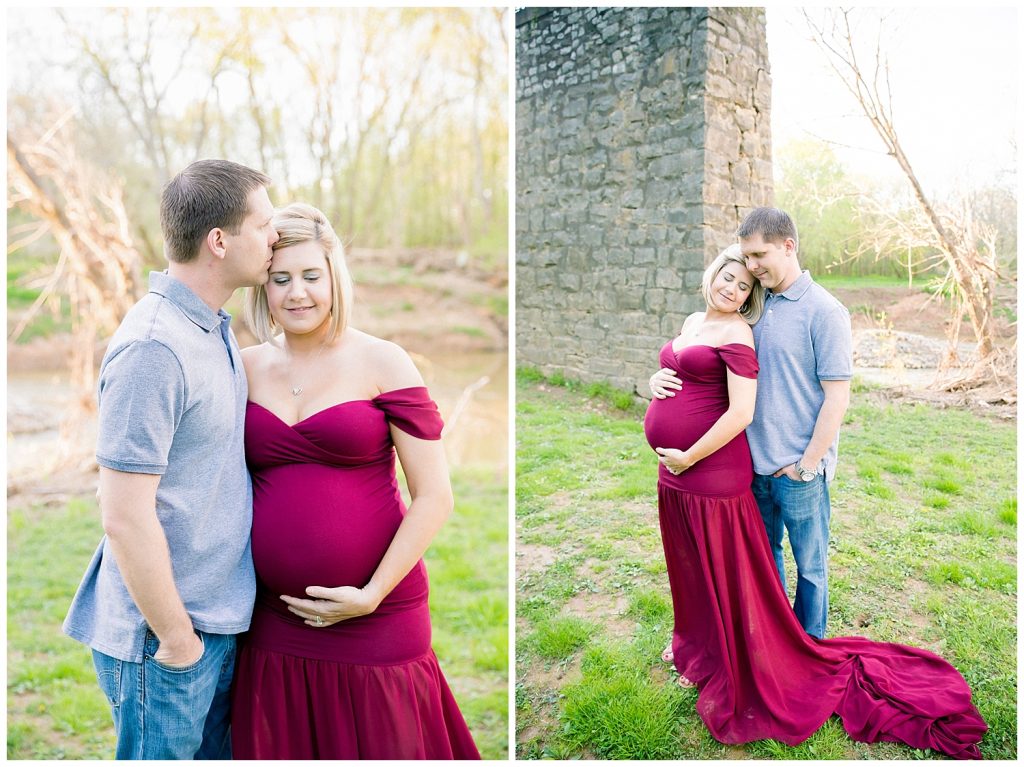 pregnant woman and man in front of rock wall