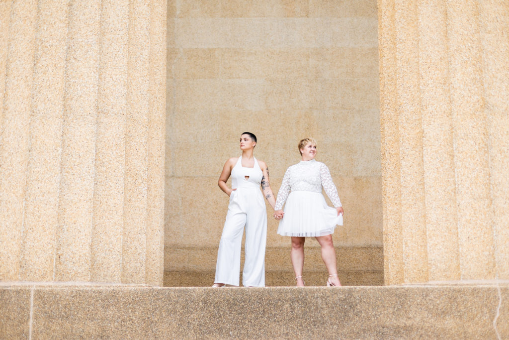 brides wearing jumpsuit and tulle dress